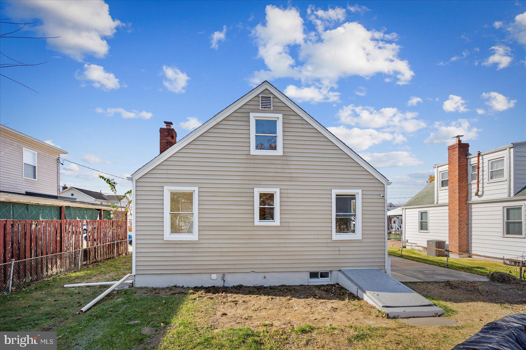 405 Margaret Avenue Baltimore, MD 21221 - Photo 36 of 38 a view of a house with a yard