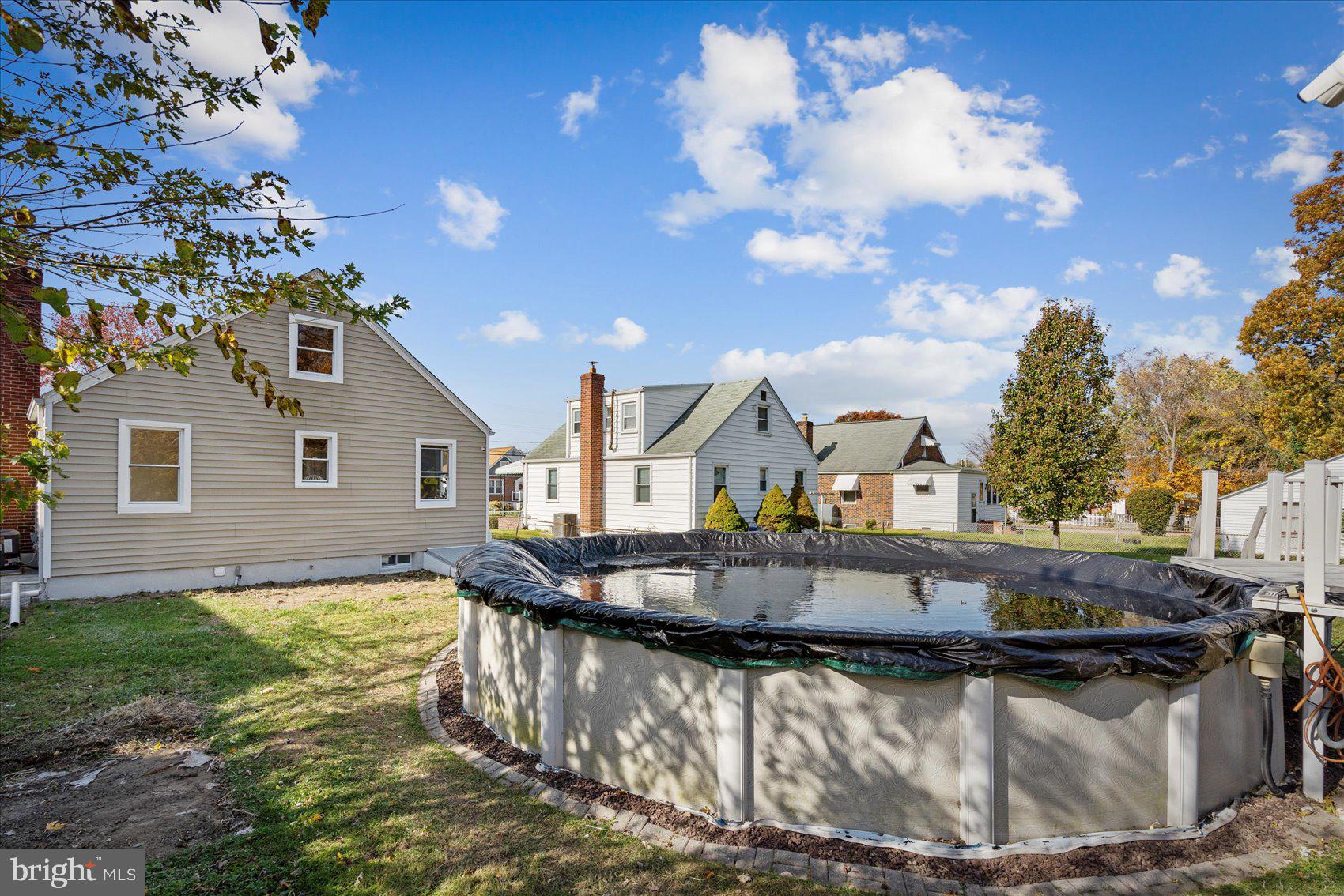 405 Margaret Avenue Baltimore, MD 21221 - Photo 38 of 38 a front view of a house with natural light