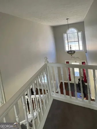 a view of an entryway with a livingroom