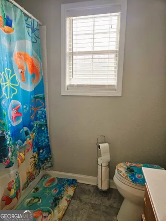 a room with toys and wooden floor