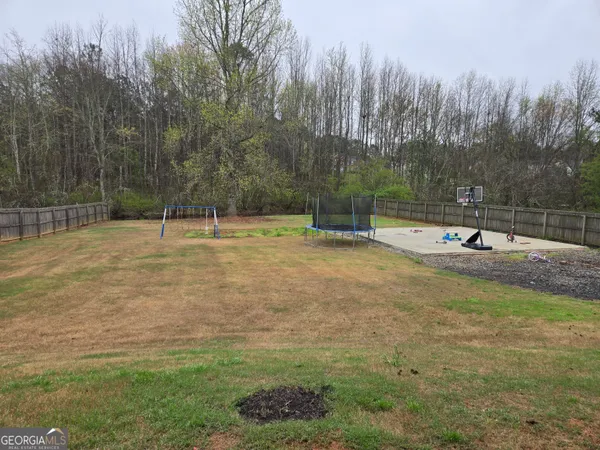 a view of park with swings
