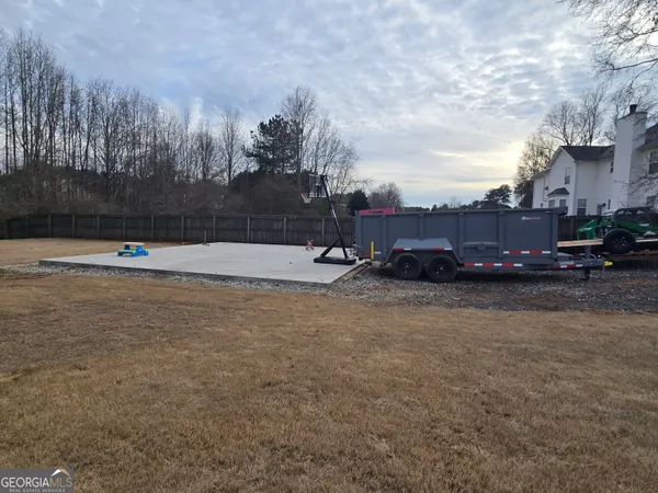 a view of a yard covered with snow