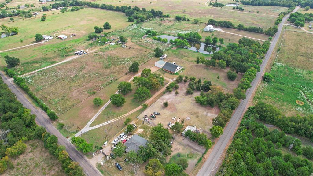 7944 County Road 669 Blue Ridge, TX 75424 - Photo 35 of 37 an aerial view of lake and residential houses with outdoor space