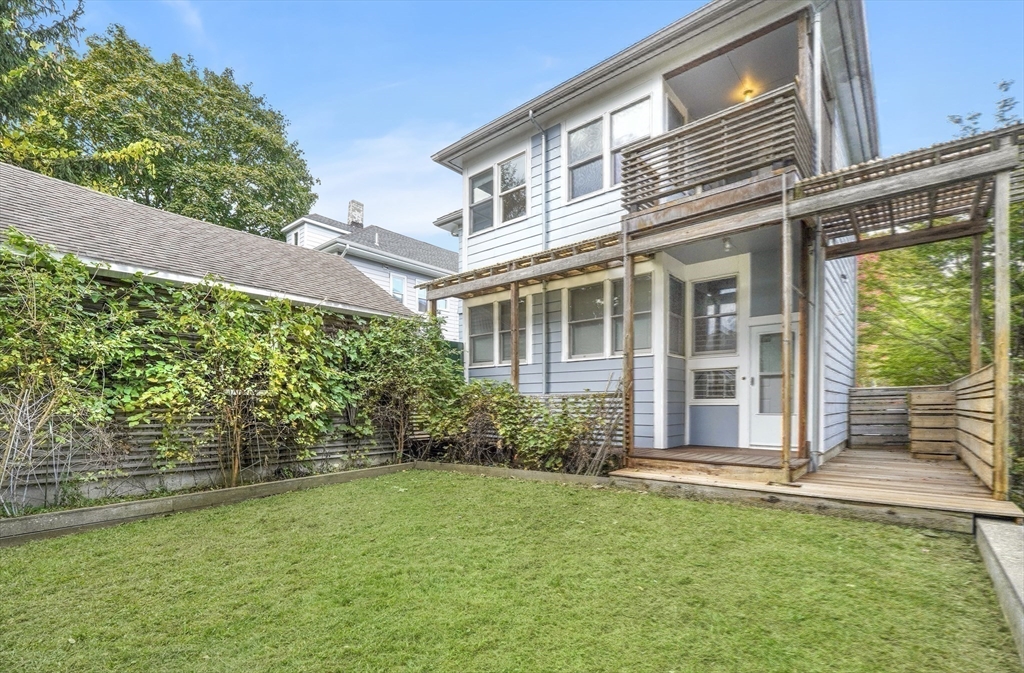 172 Maplewood Street Watertown, MA 02472 - Photo 31 of 42 a view of a house with backyard and garden