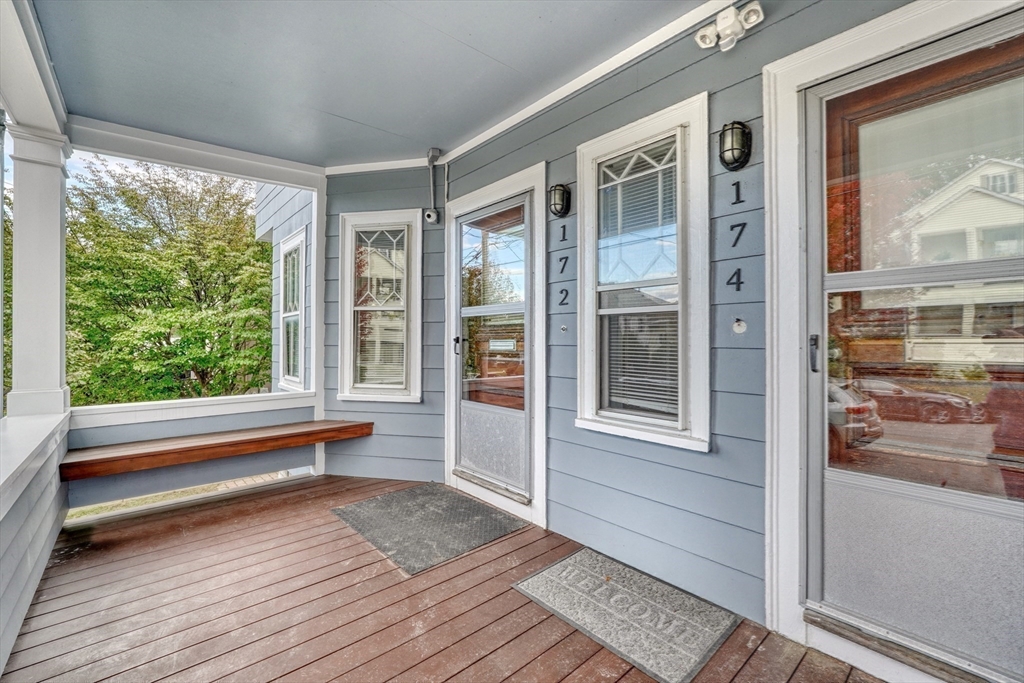 172 Maplewood Street Watertown, MA 02472 - Photo 37 of 42 a view of front door and deck of the house