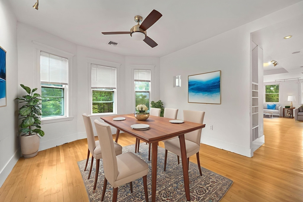 172 Maplewood Street Watertown, MA 02472 - Photo 6 of 42 a view of a dining room with furniture and wooden floor
