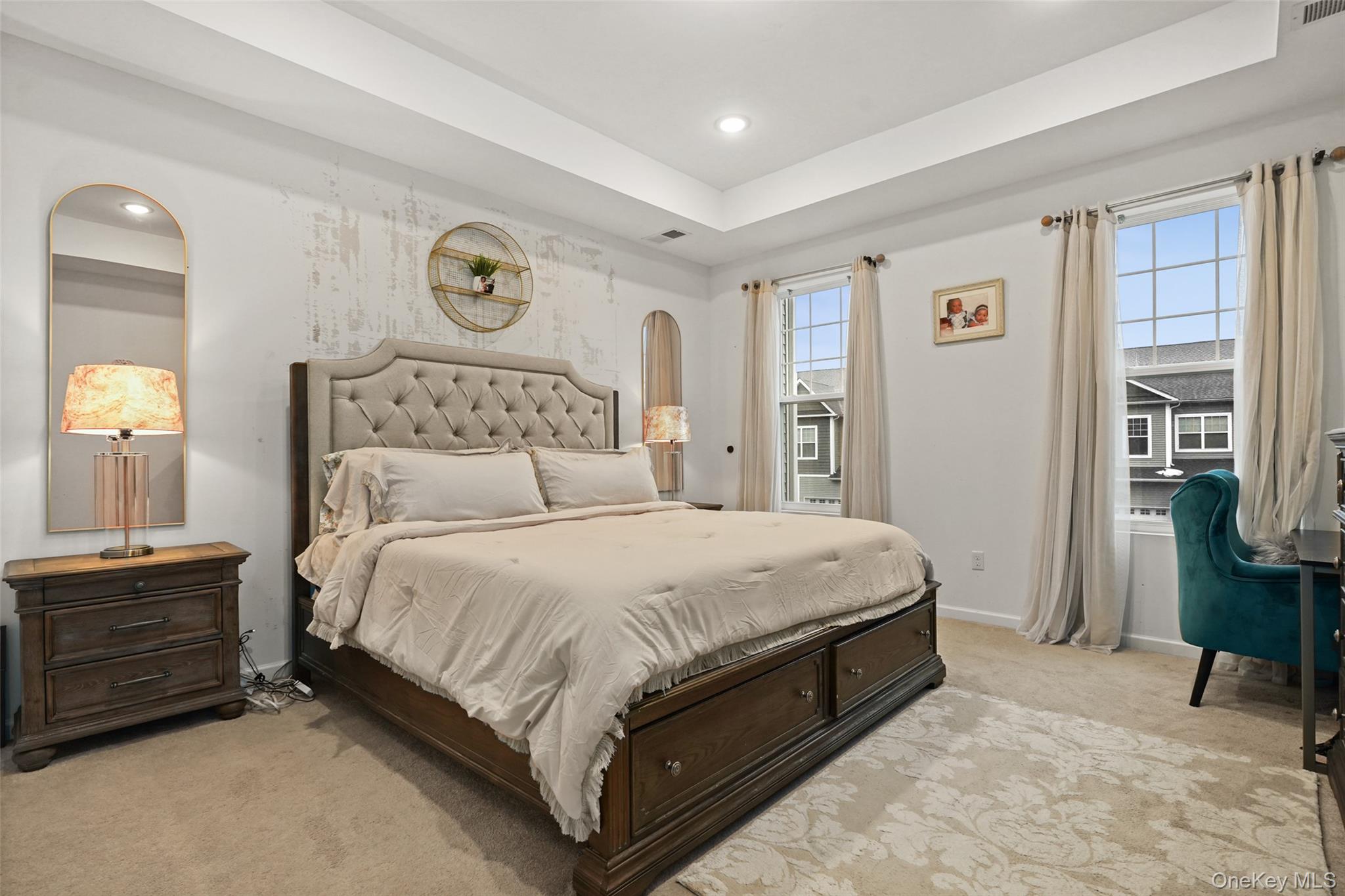 28 Magnolia Pk Road Middletown, NY 10940 - Photo 13 of 25 a bedroom with a bed and a chandelier