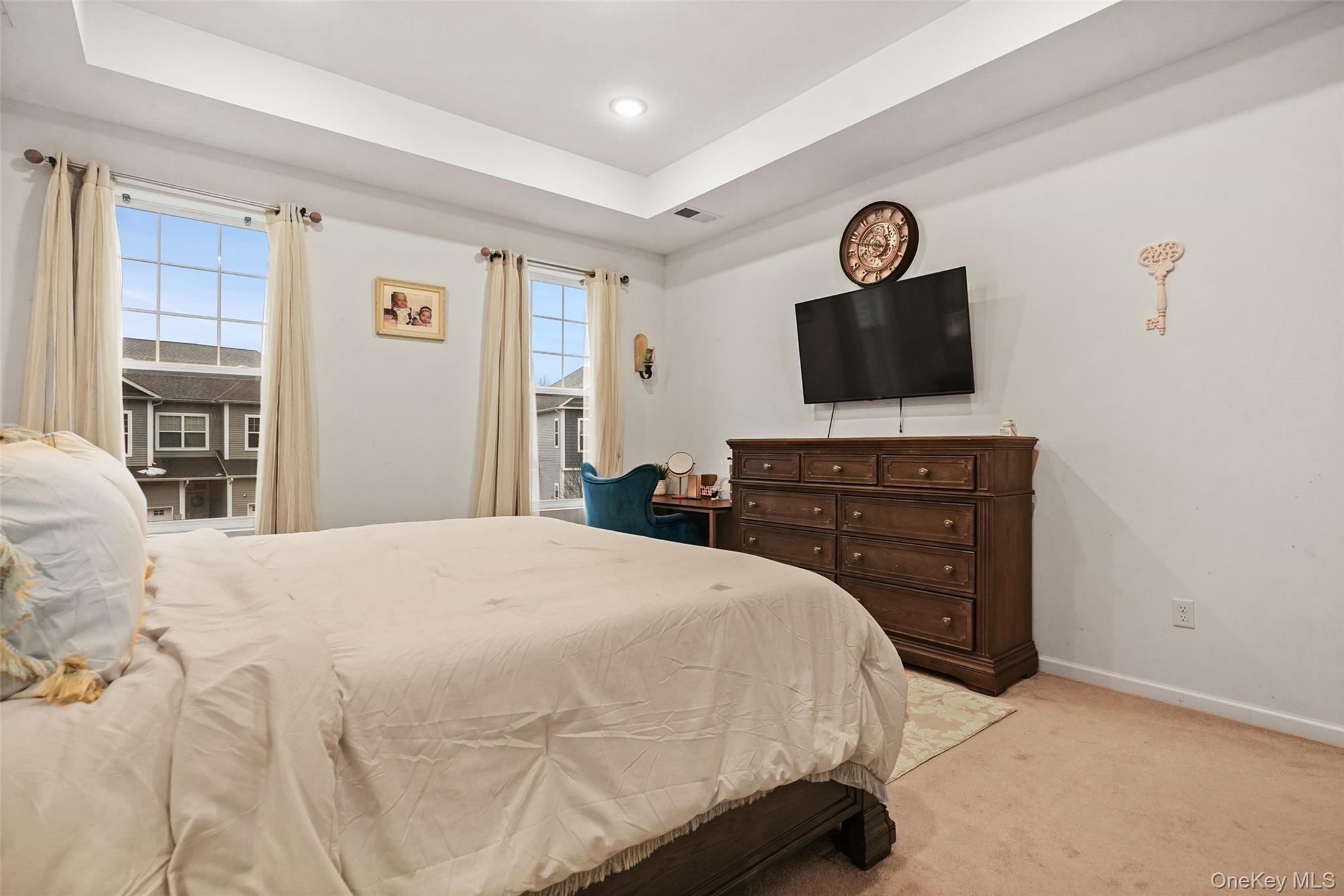 28 Magnolia Pk Road Middletown, NY 10940 - Photo 14 of 25 a bedroom with a bed and a flat screen tv