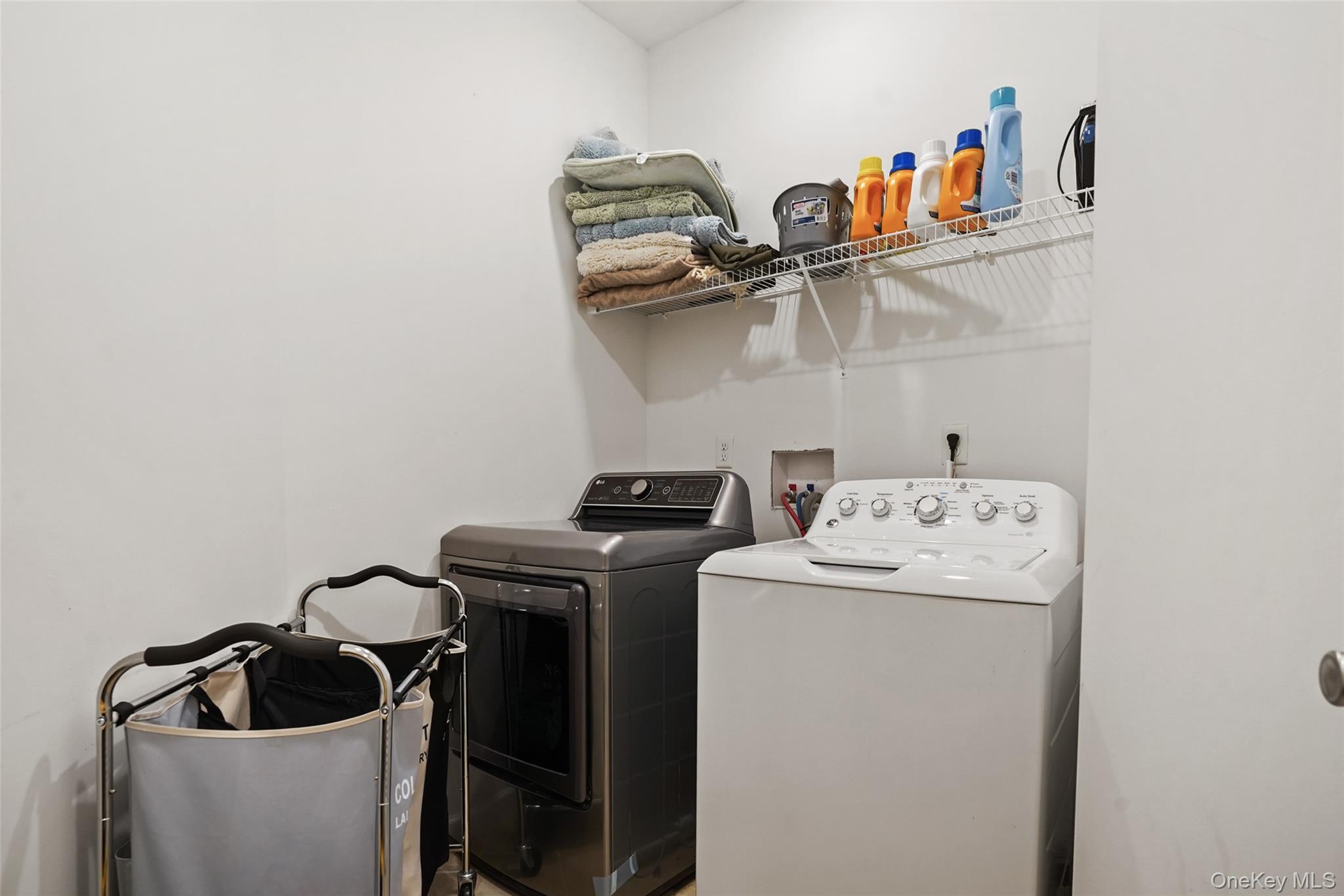28 Magnolia Pk Road Middletown, NY 10940 - Photo 20 of 25 a view of storage and utility room with washer and dryer