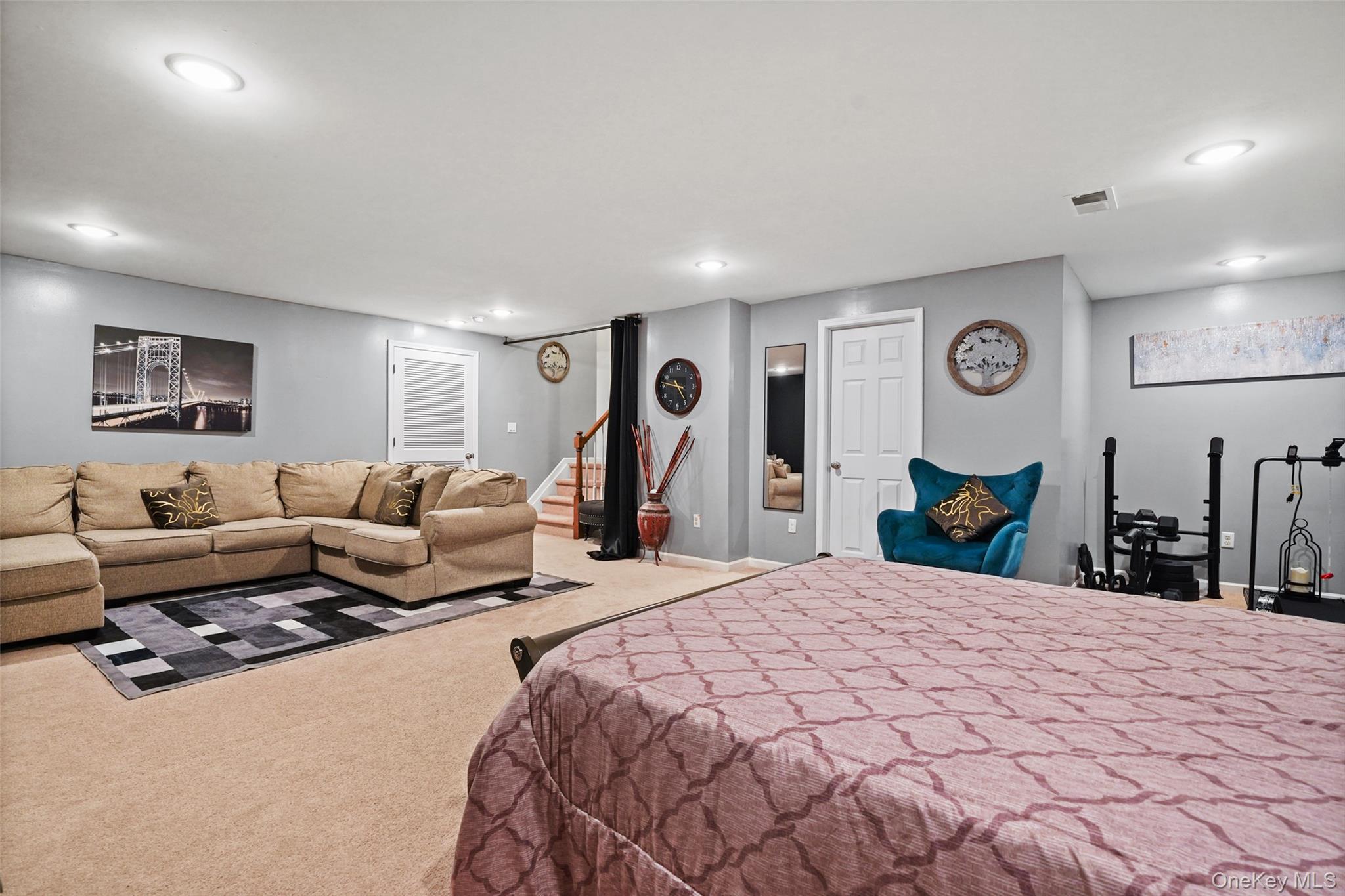 28 Magnolia Pk Road Middletown, NY 10940 - Photo 23 of 25 a large bedroom with a bed and a couch