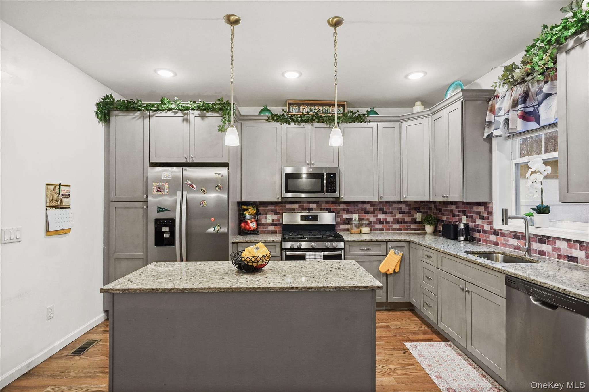 28 Magnolia Pk Road Middletown, NY 10940 - Photo 3 of 25 a kitchen with cabinets and stainless steel appliances
