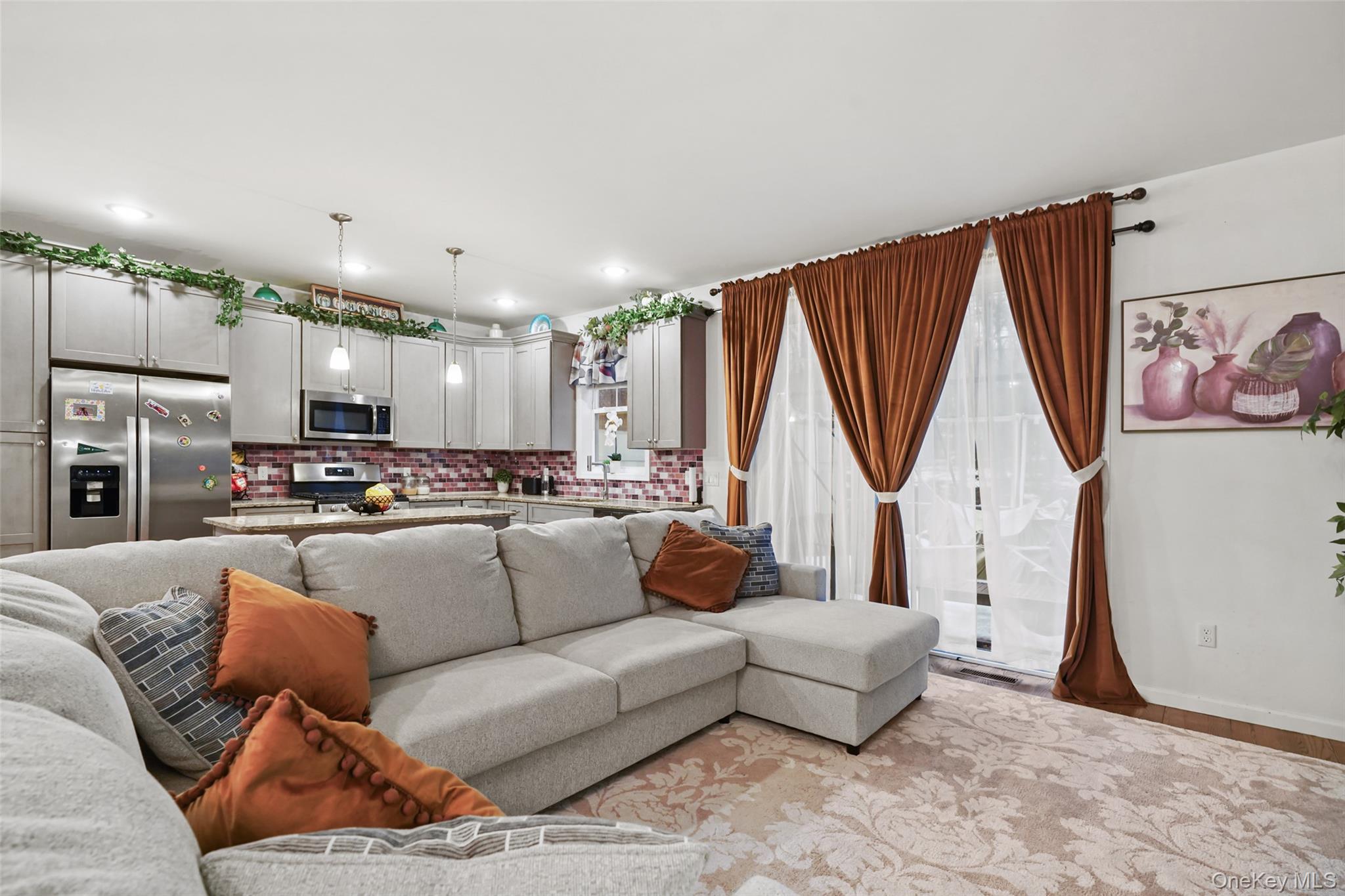 28 Magnolia Pk Road Middletown, NY 10940 - Photo 6 of 25 a living room with furniture and a large window