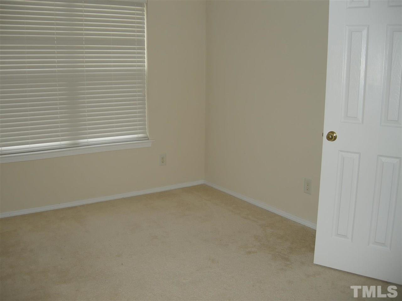 8423 Header Stone Drive Raleigh, NC 27613 - Photo 14 of 14 a view of a small space with a window