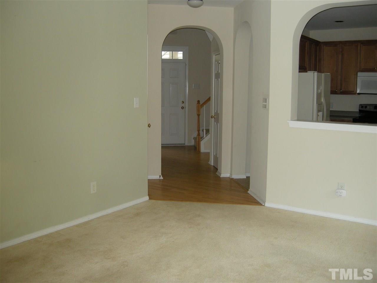 8423 Header Stone Drive Raleigh, NC 27613 - Photo 6 of 14 a view of a hallway with a bathroom