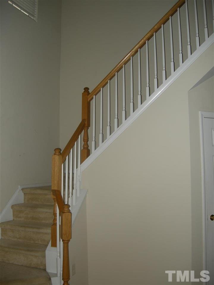 8423 Header Stone Drive Raleigh, NC 27613 - Photo 7 of 14 a view of entryway with wooden floor