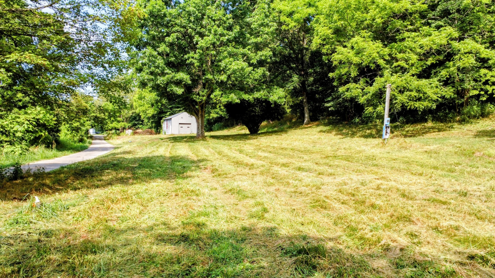 130 Ben Johnson Road Pulaski, TN 38478 - Photo 8 of 10 a swimming pool with trees in front of it