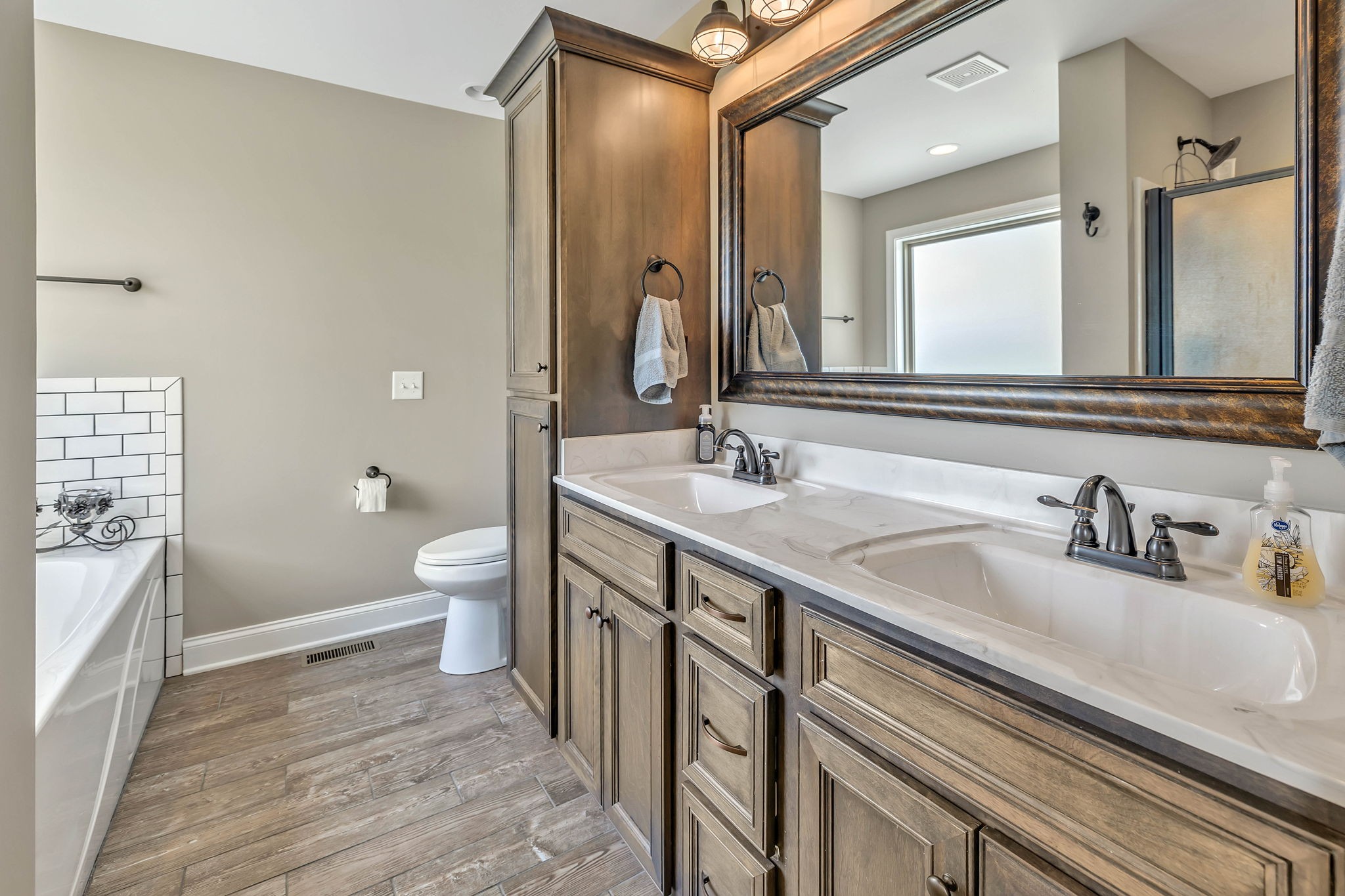 8087 Dunn Road Cedar Hill, TN 37032 - Photo 16 of 33 a bathroom with a granite countertop sink mirror and toilet
