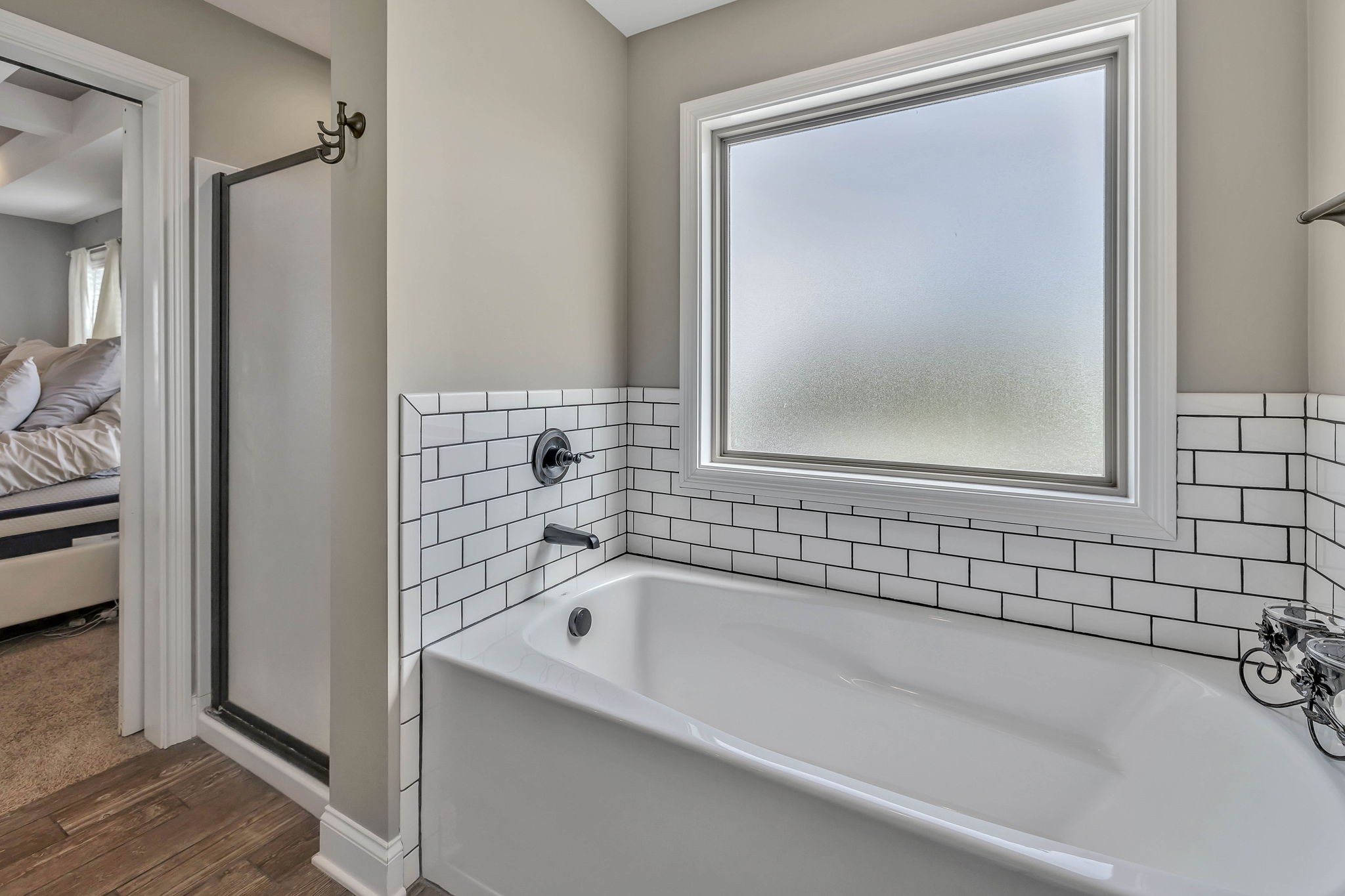 8087 Dunn Road Cedar Hill, TN 37032 - Photo 17 of 33 a bathroom with a bathtub and a shower