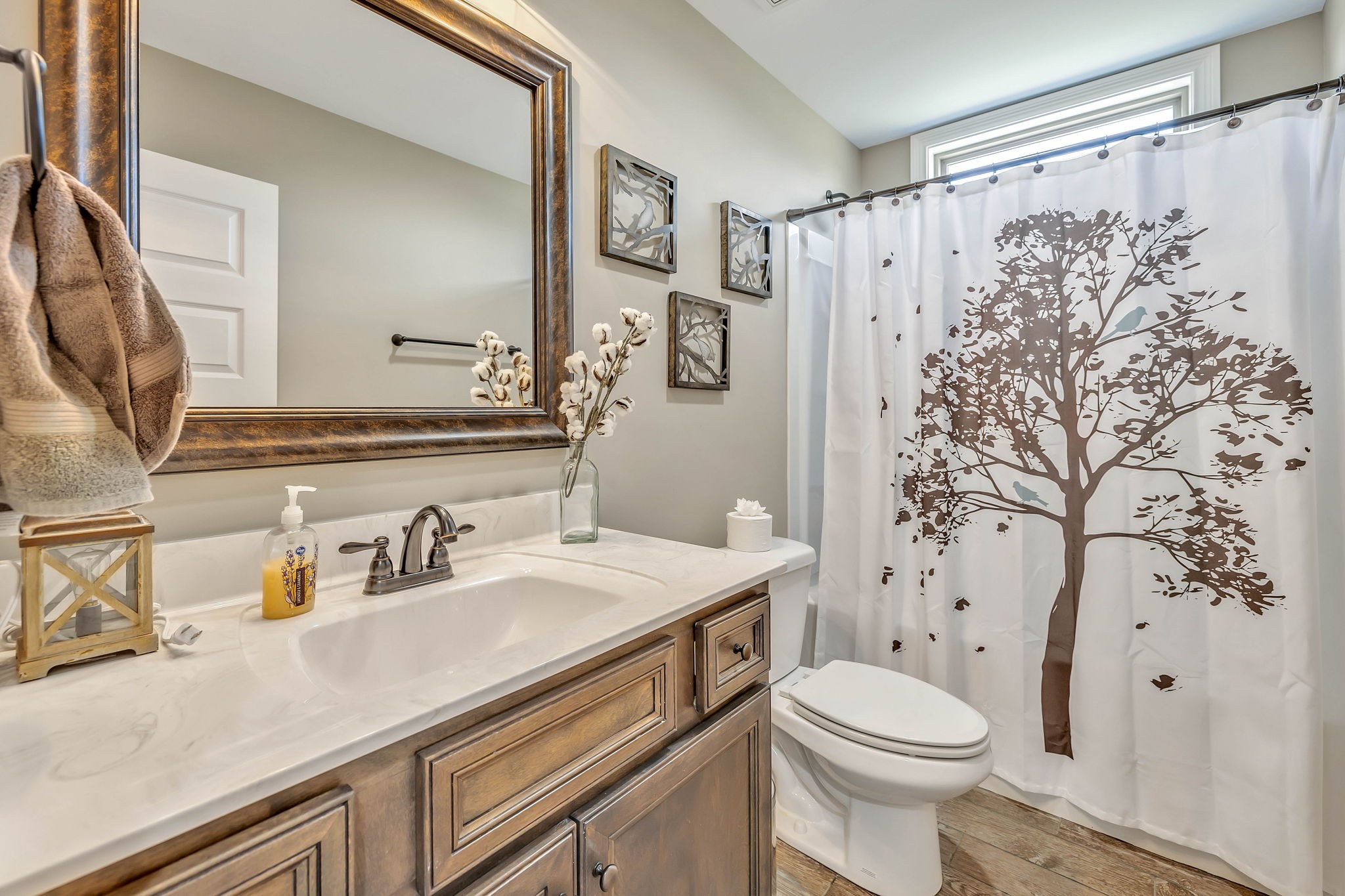 8087 Dunn Road Cedar Hill, TN 37032 - Photo 20 of 33 a bathroom with a sink toilet and shower