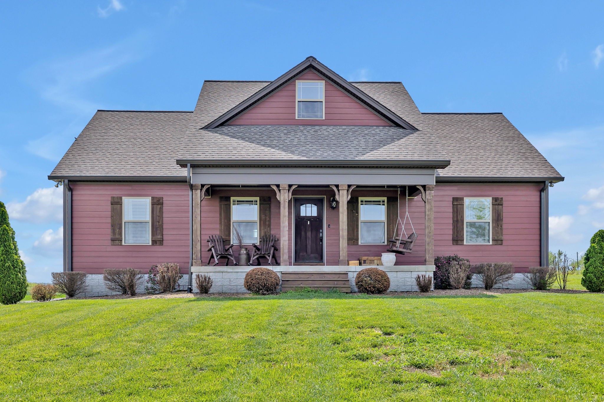 8087 Dunn Road Cedar Hill, TN 37032 - Photo 2 of 33 a front view of a house with garden