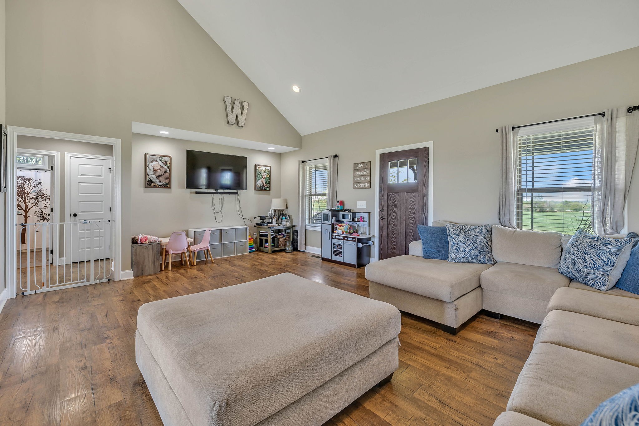 8087 Dunn Road Cedar Hill, TN 37032 - Photo 8 of 33 a living room with furniture and painting on the wall