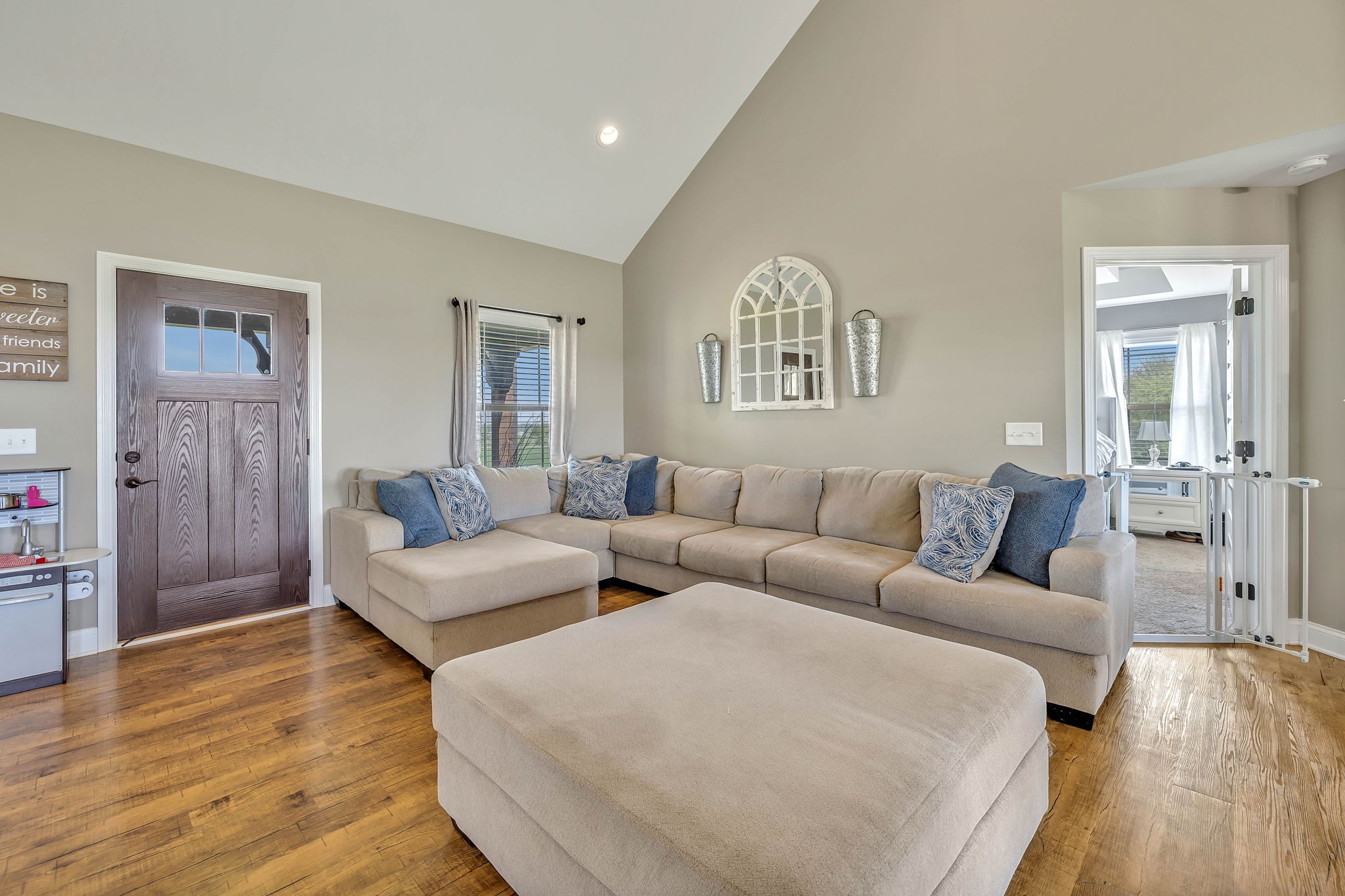 8087 Dunn Road Cedar Hill, TN 37032 - Photo 9 of 33 a living room with furniture and a wooden floor