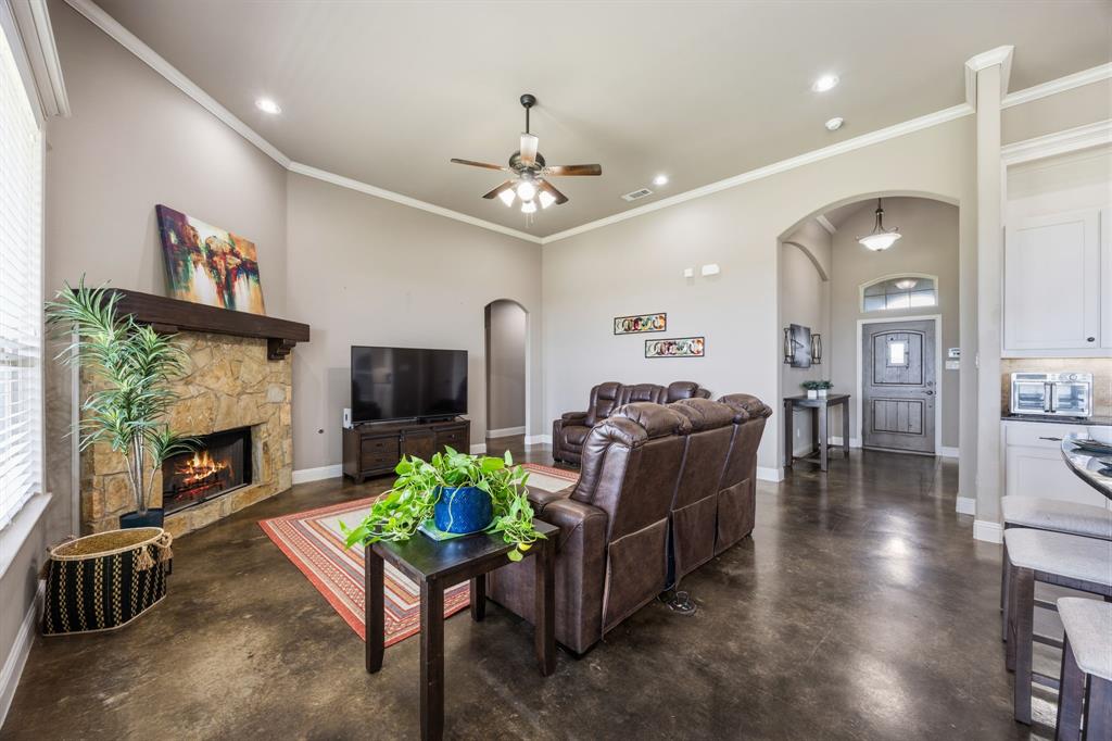 6621 Singleton Road Midlothian, TX 76065 - Photo 8 of 32 Gas or wood burning fireplace. Tall ceilings. Crown molding.
