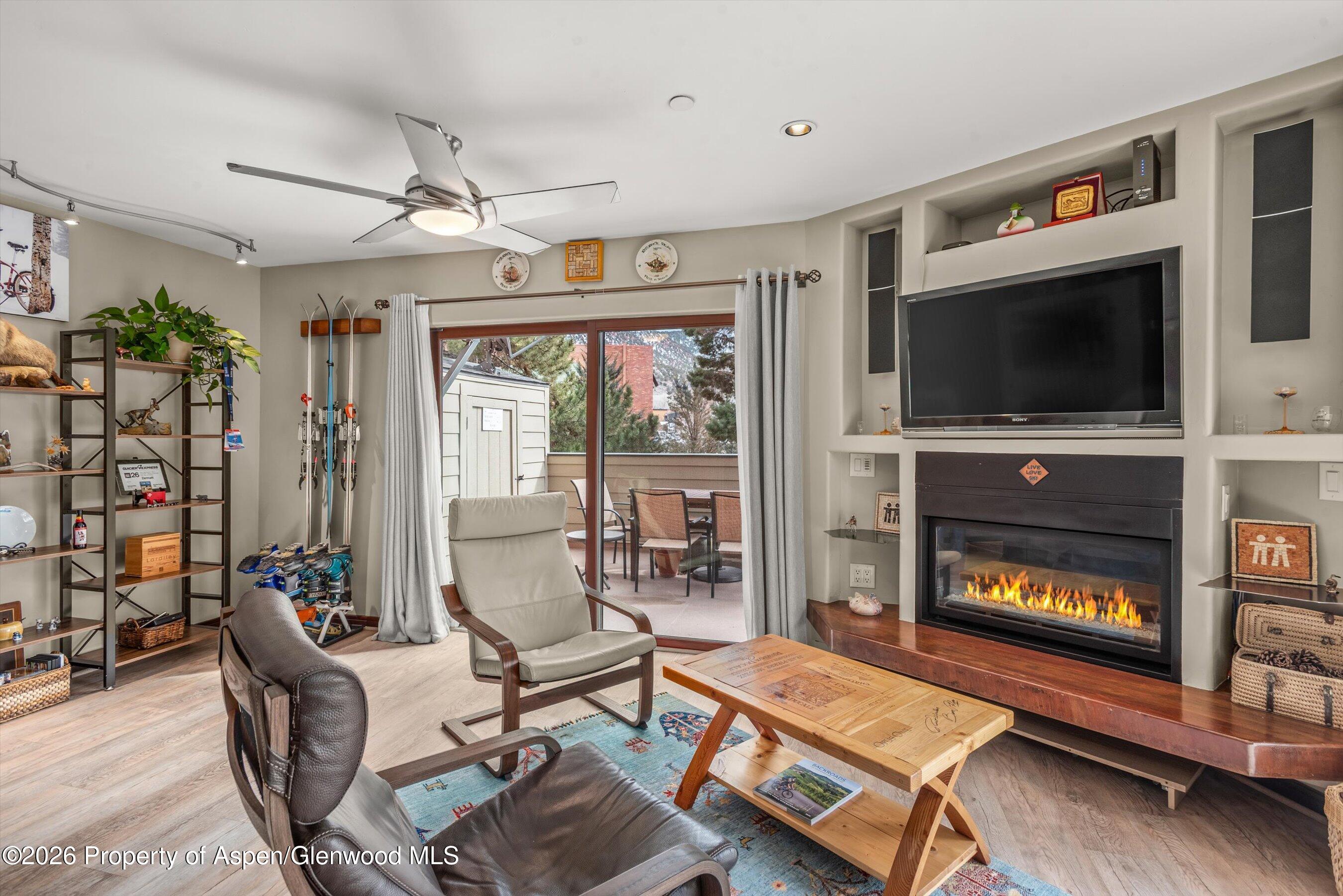 100 Midland Avenue, Unit 104 Basalt, CO 81621 - Photo 3 of 18 LIVING ROOM WITH FIREPLACE