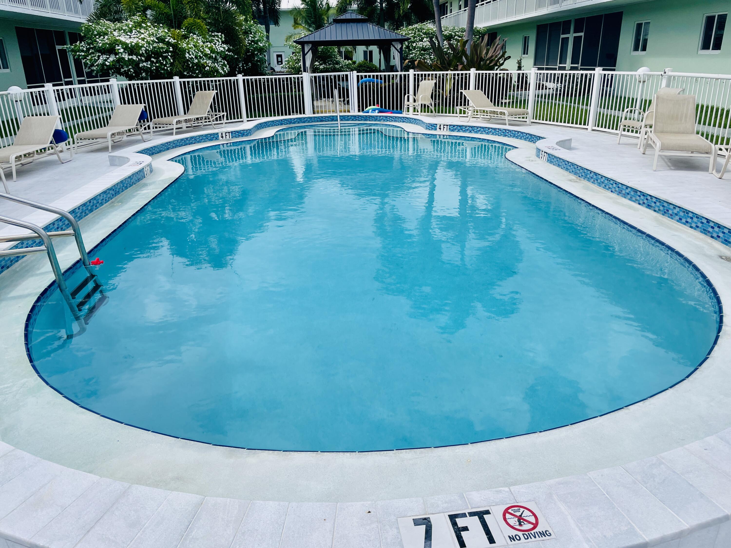 2100 Northeast 38th Street, Unit 142 Lighthouse Point, FL 33064 - Photo 35 of 42 Pool Area (3)