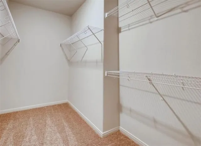 a view of a room with racks on the wall