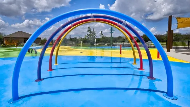 a view of swimming pool with a balcony