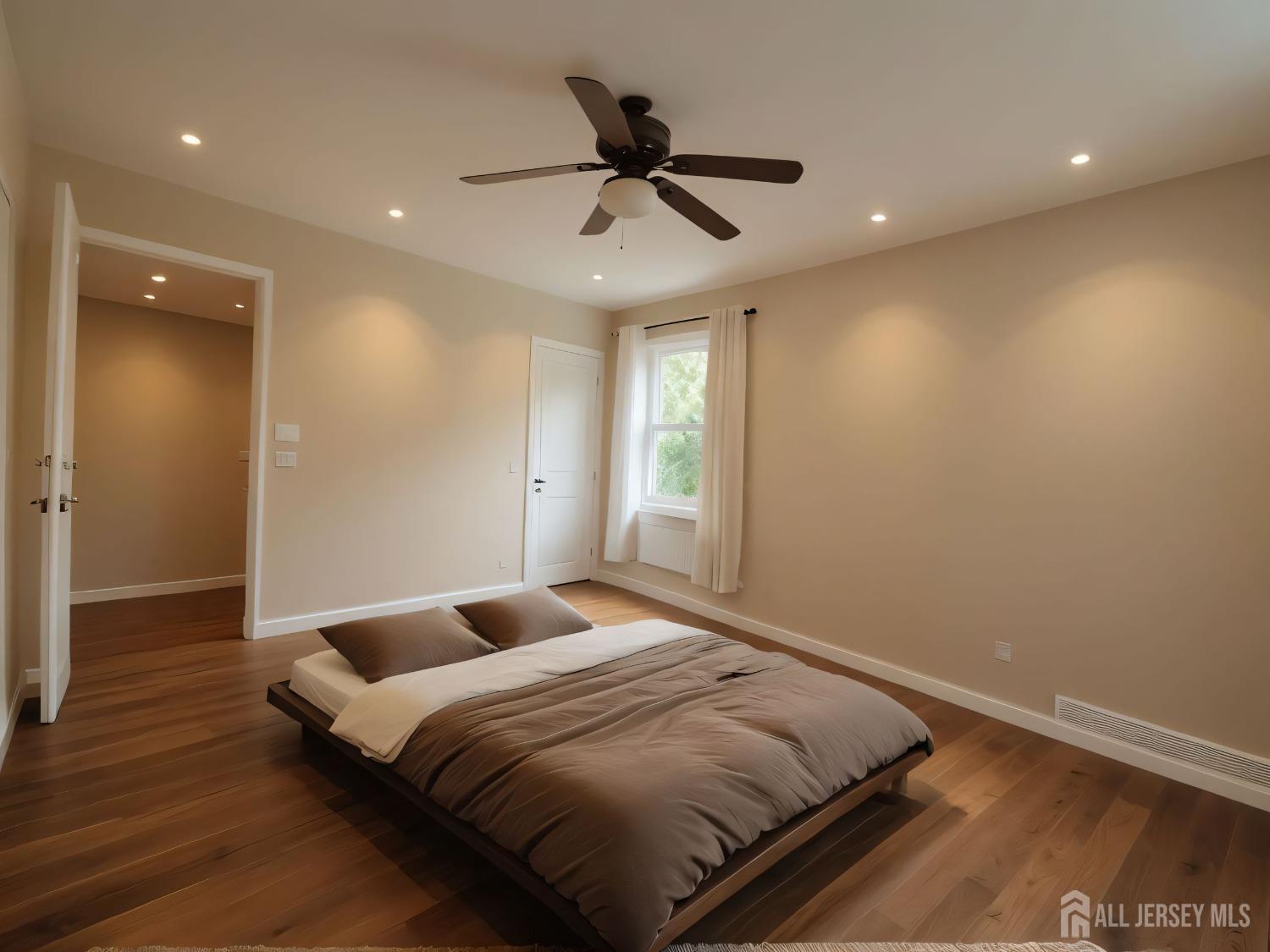 50 Fox Road, Unit 8B Edison, NJ 08817 - Photo 21 of 35 a bedroom with a bed and a ceiling fan