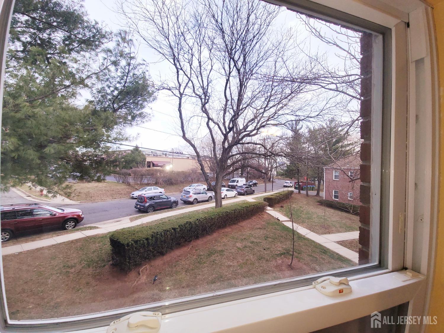 50 Fox Road, Unit 8B Edison, NJ 08817 - Photo 22 of 35 a view of a yard from a window