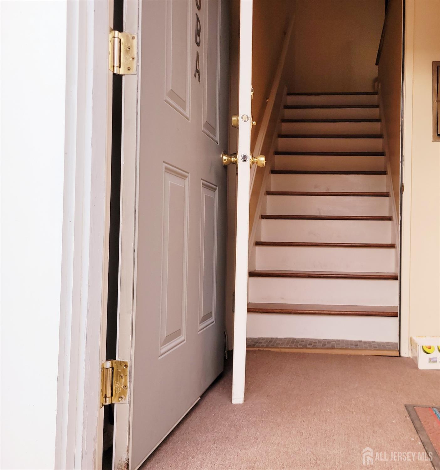 50 Fox Road, Unit 8B Edison, NJ 08817 - Photo 5 of 35 a view of entryway with staircase