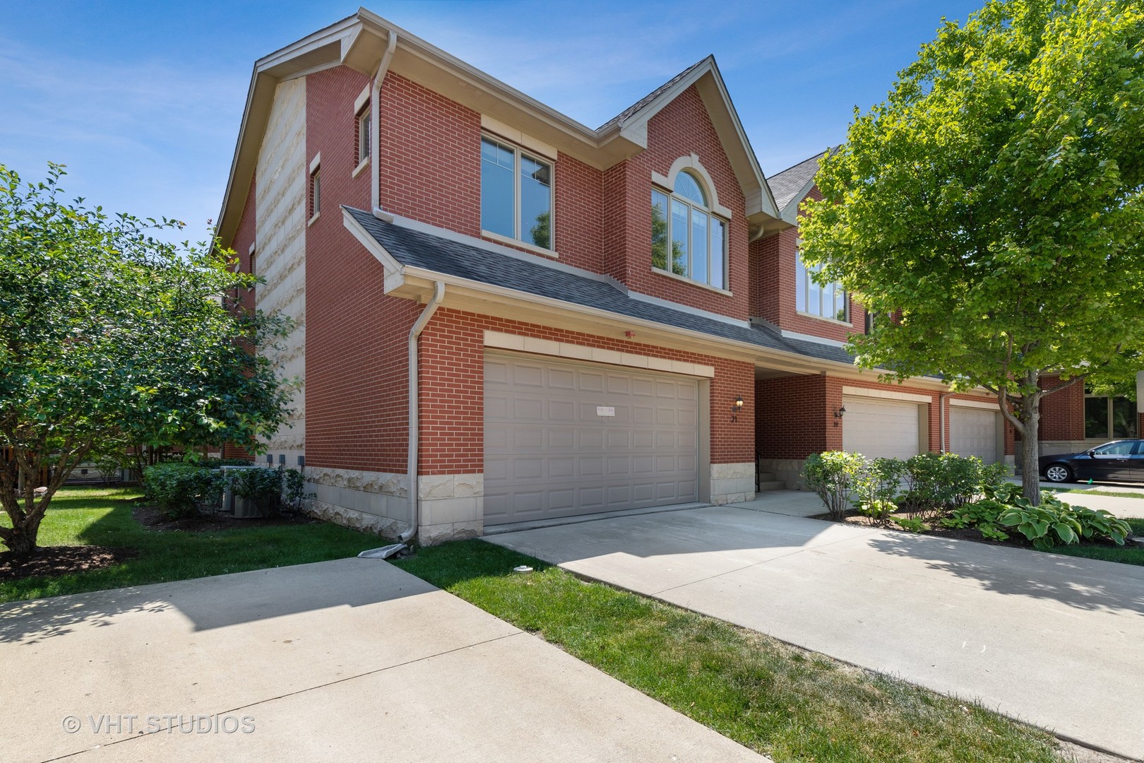 21 Northfield Terrace, Unit 21 Wheeling, IL 60090 - Photo 1 of 18 front view of a house