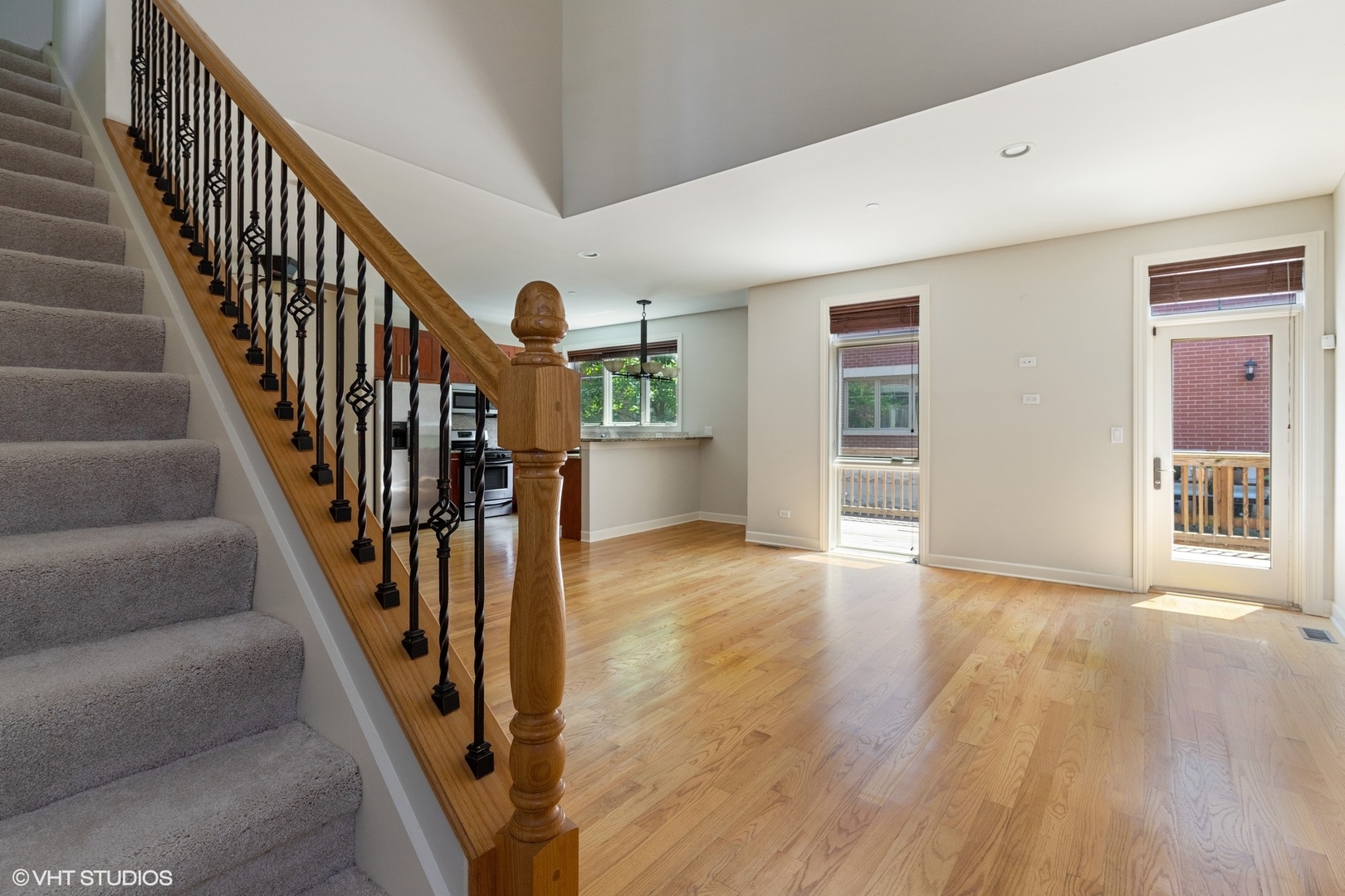 21 Northfield Terrace, Unit 21 Wheeling, IL 60090 - Photo 4 of 18 a view of an entryway with wooden floor and stairs