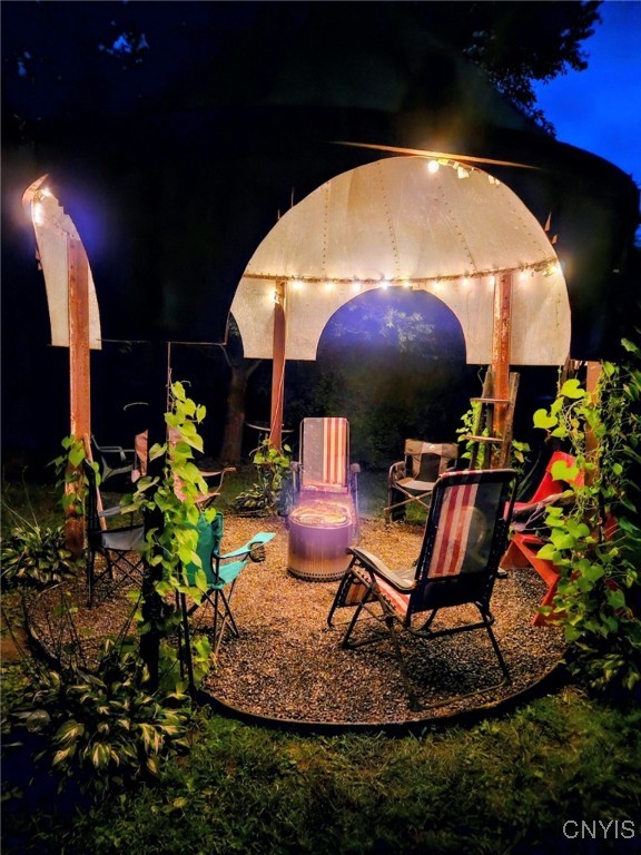 1218 Hard Point Road Conquest, NY 13140 - Photo 8 of 45 Gazebo/ Fire pit area many plants come back yearly