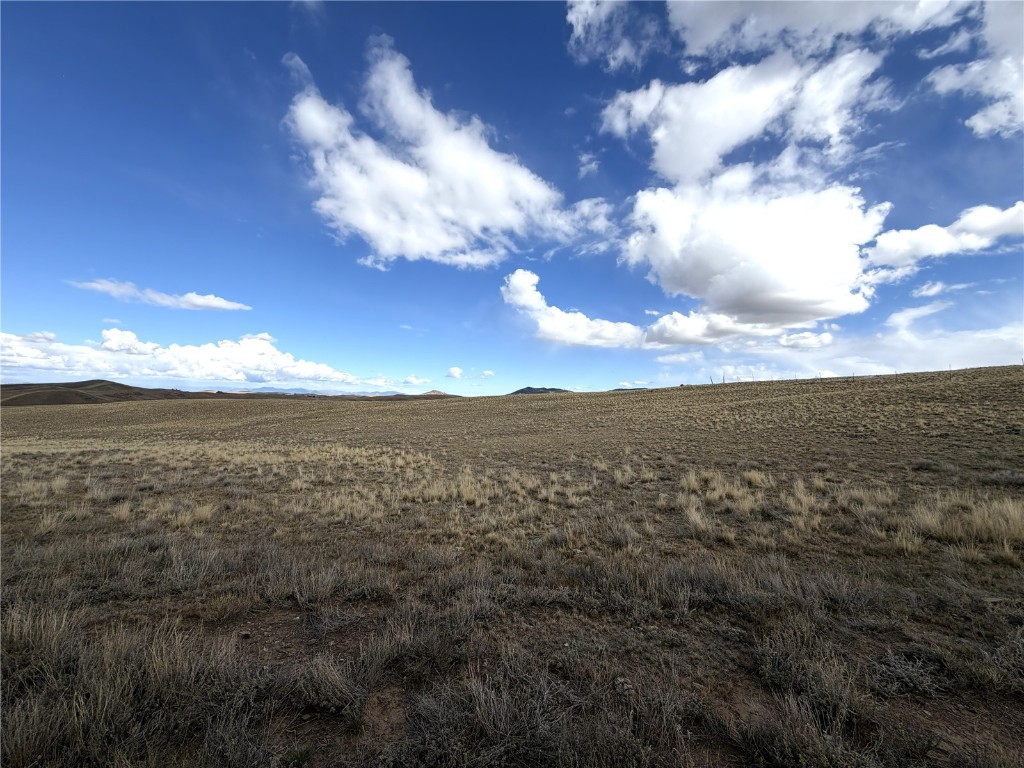 0 Wichita Trail Hartsel, CO 80449 - Photo 1 of 15 a view of a city with sunset