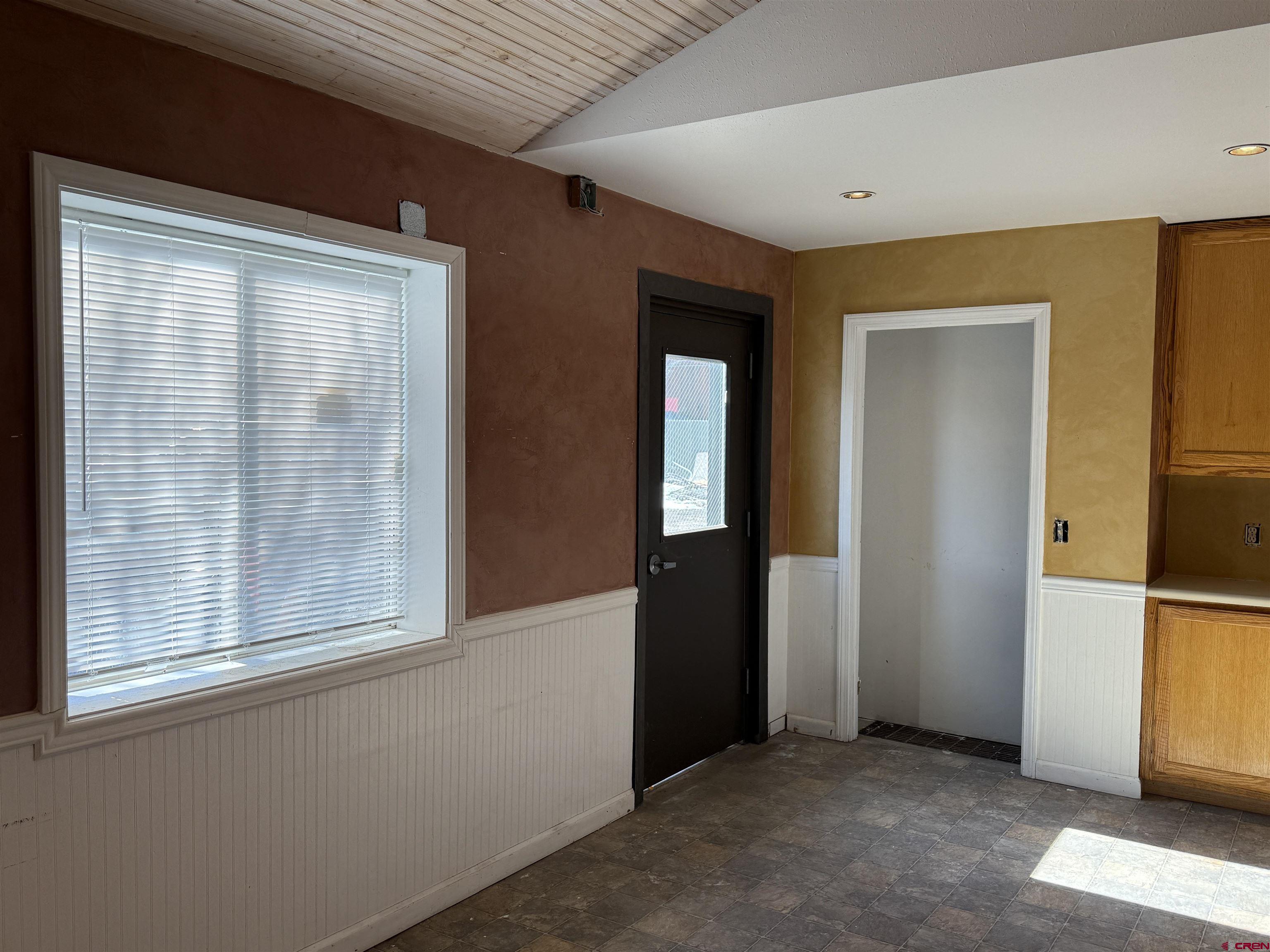an empty room with windows