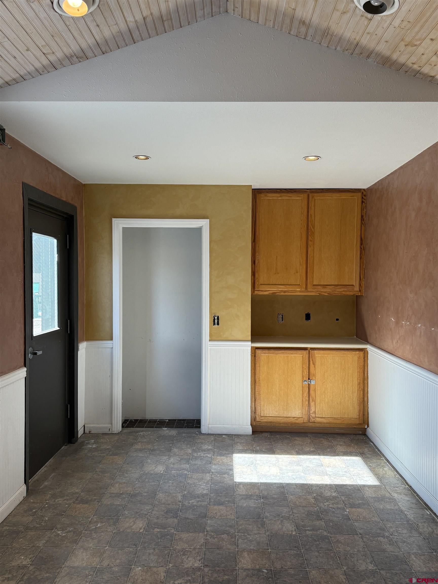 158 Liddell Drive, Unit D Ridgway, CO 81432 - Photo 8 of 8 an empty room with wooden floor and windows