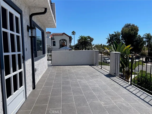 a view of a balcony with door