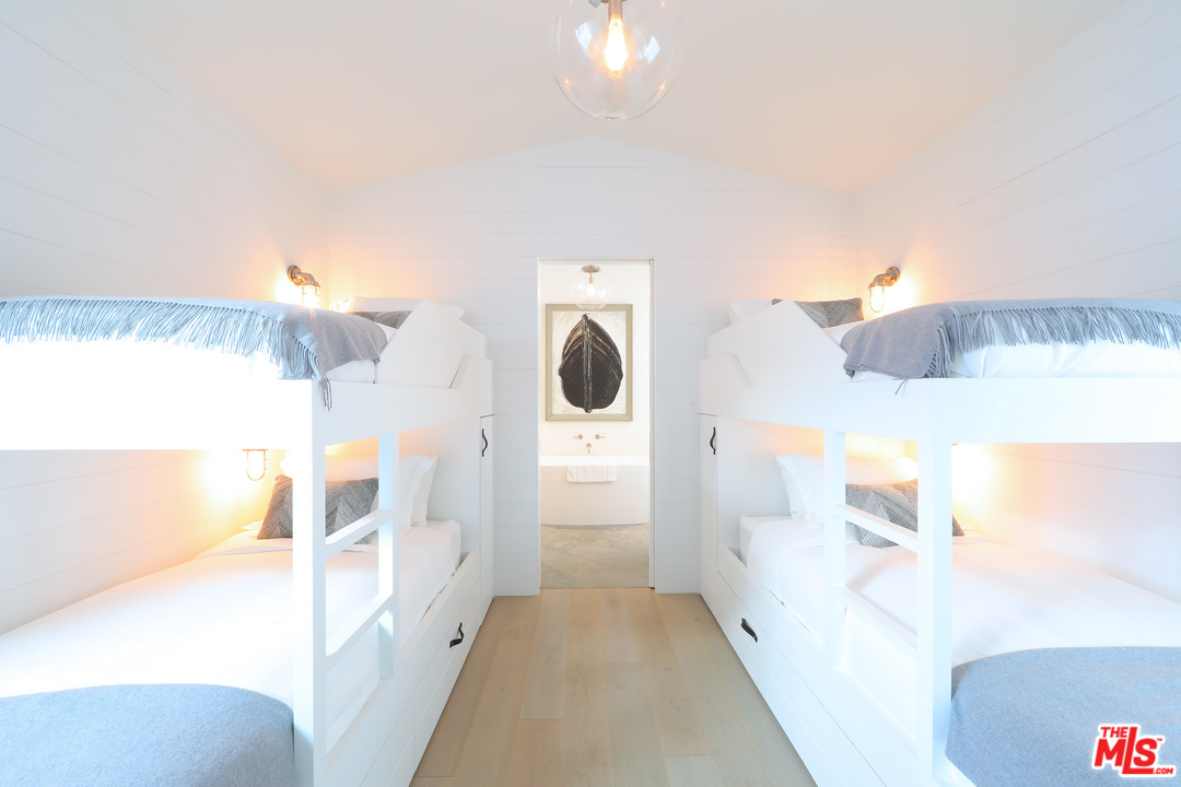 23956 Malibu Road Malibu, CA 90265 - Photo 19 of 26 a bathroom with a bathtub sink and mirror