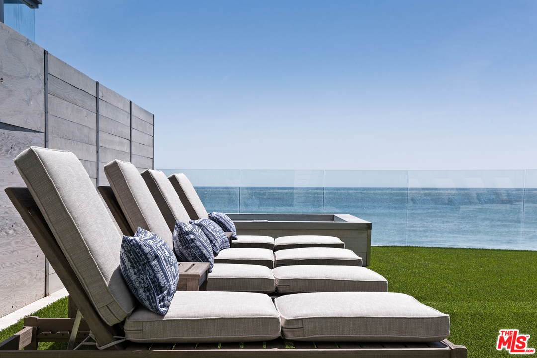 23956 Malibu Road Malibu, CA 90265 - Photo 22 of 26 a view of a chairs and table in patio