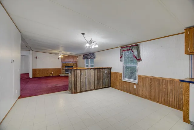 a view of a livingroom with furniture