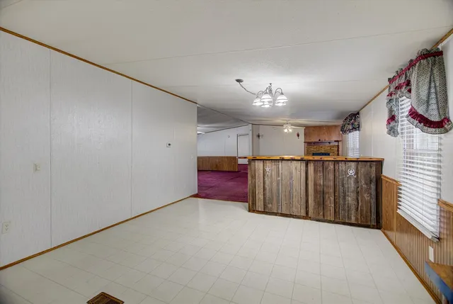 a view of kitchen with furniture