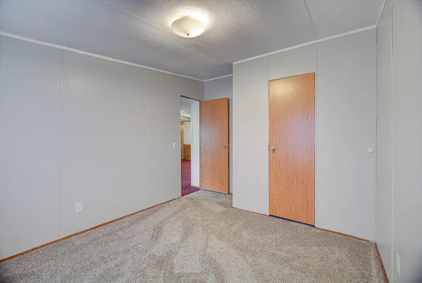 an empty room with closet