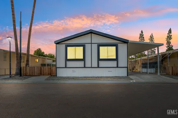a view of a house with a street