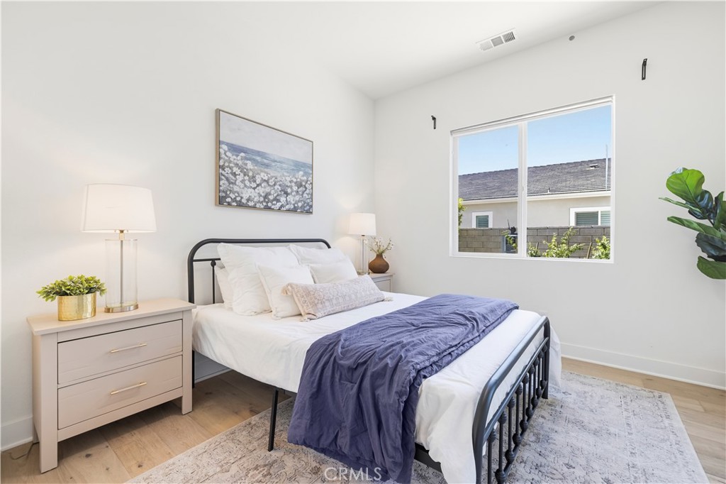 28346 Old Spgs Road Castaic, CA 91384 - Photo 36 of 80 a bedroom with a bed and a window