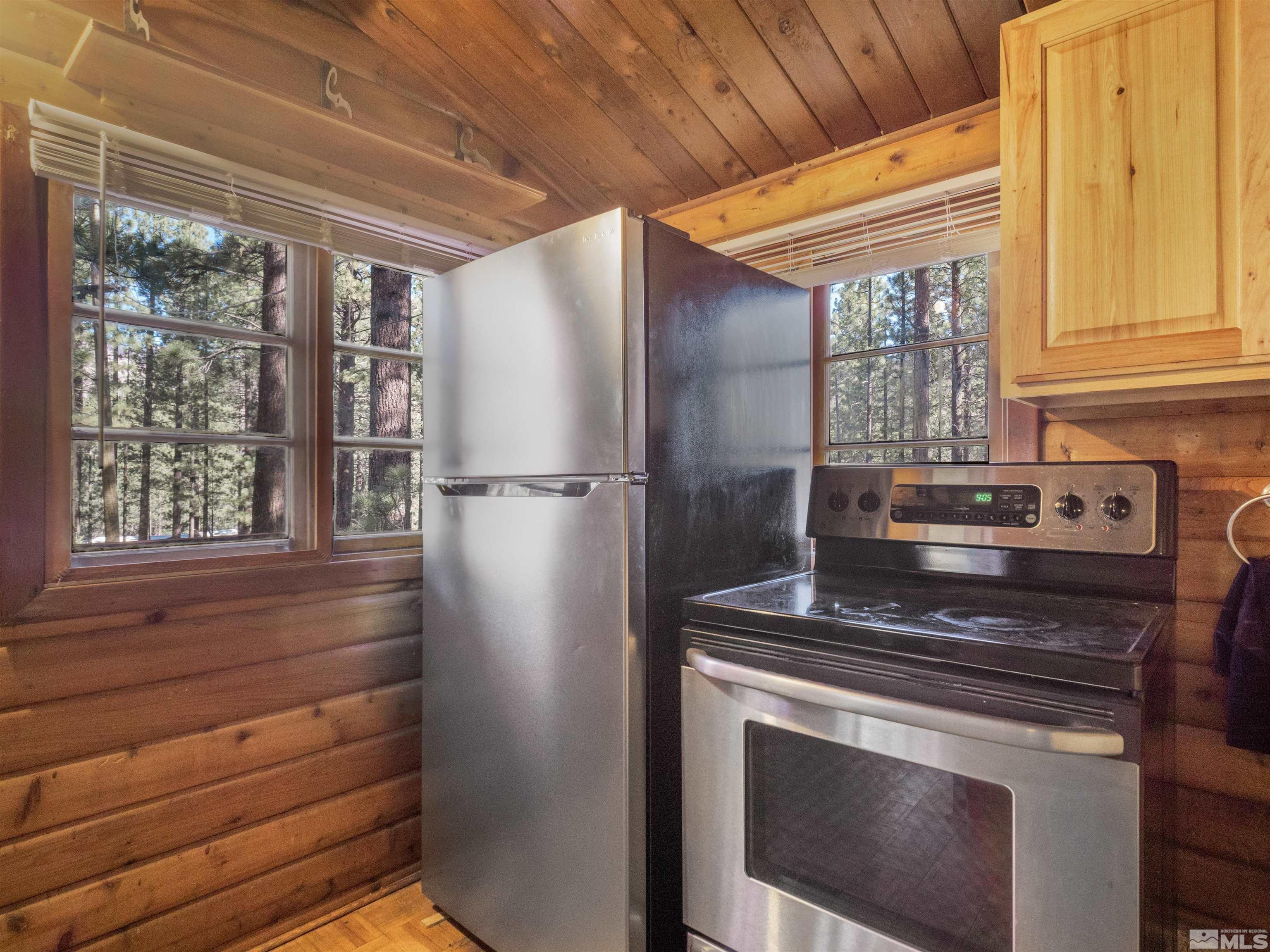 77 Ox Bow Markleeville, CA 96120 - Photo 16 of 33 a kitchen with a stove and a refrigerator