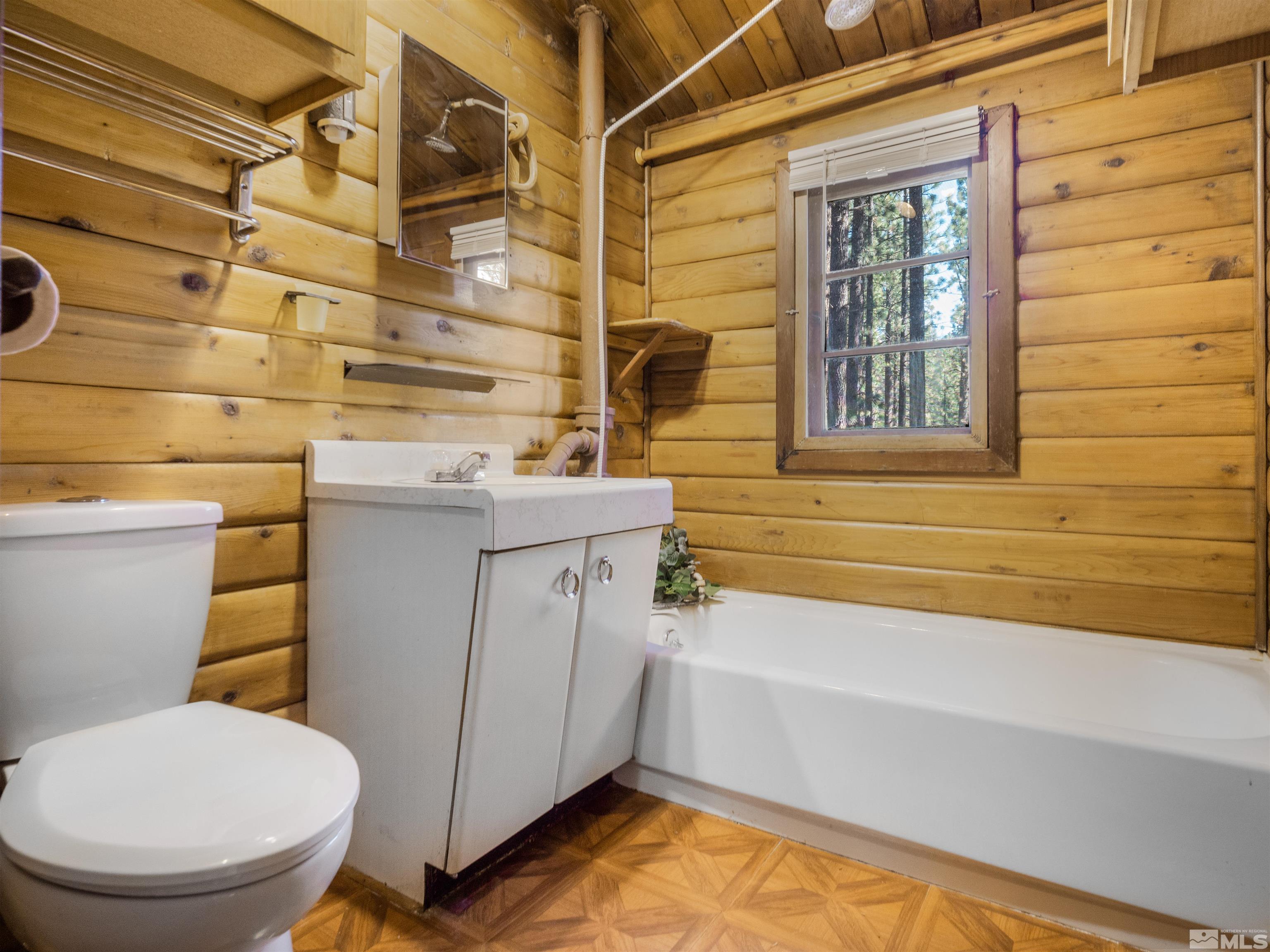 77 Ox Bow Markleeville, CA 96120 - Photo 23 of 33 a bathroom with a sink toilet and shower
